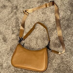 Status Anxiety look both ways bag. Camel.